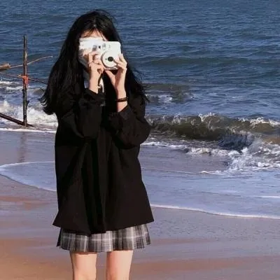 摄影系列作品归档与视觉风格整理 海边黑色服装写真