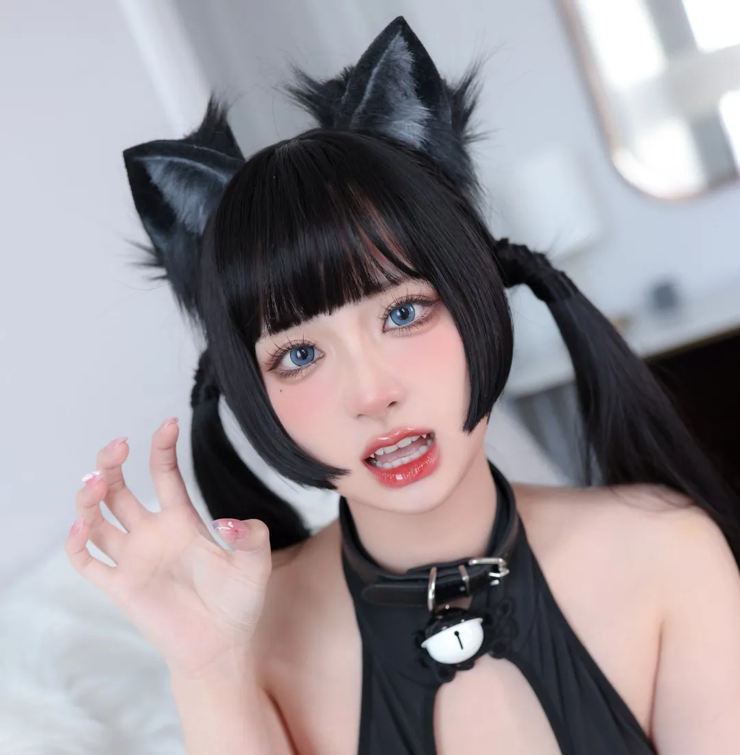 摄影系列作品归档 黑色猫耳造型与深色服装搭配照片